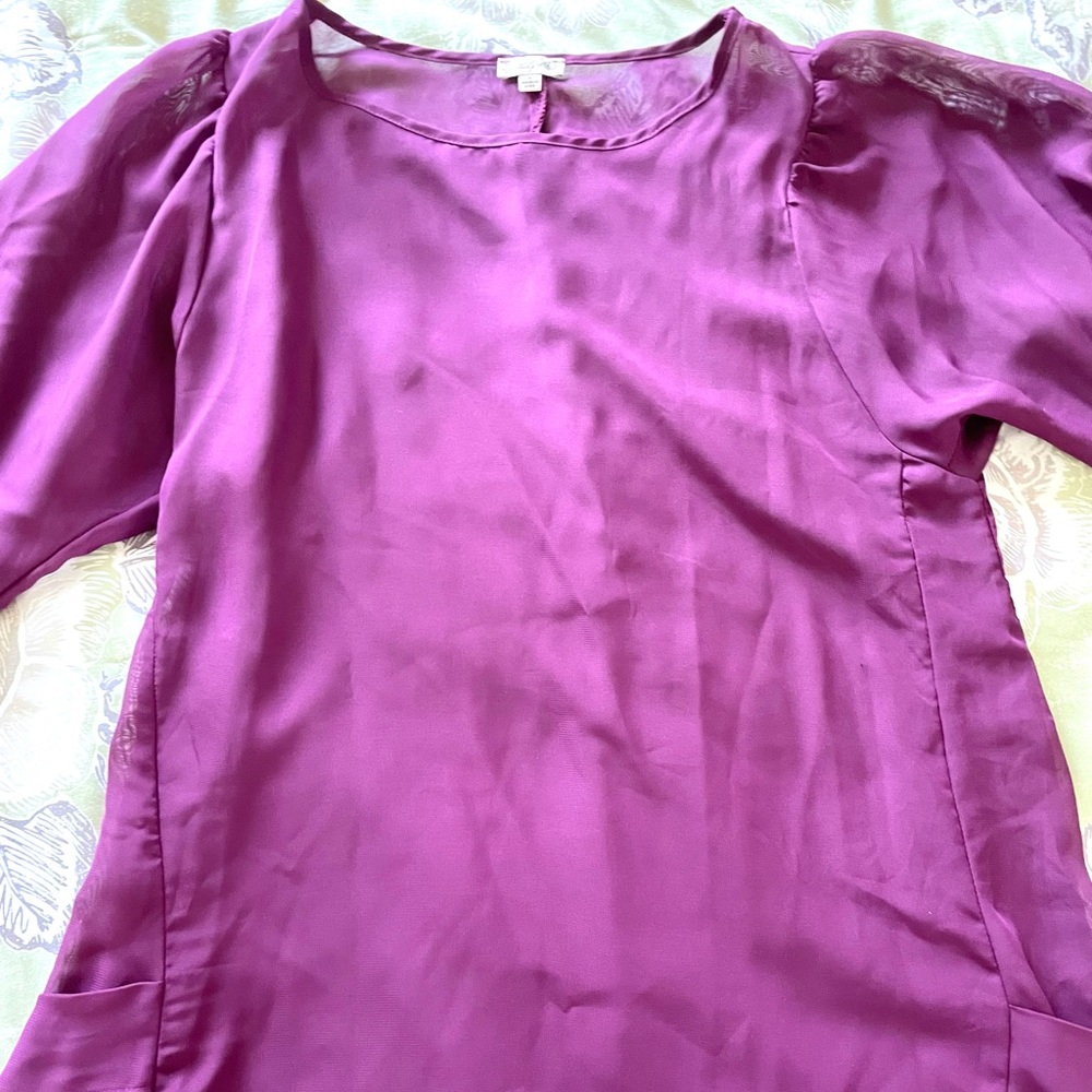 Large, long sleeve dress